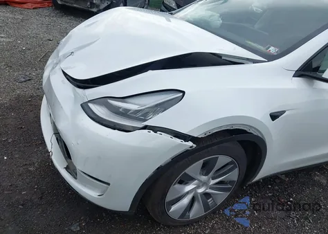 2023 Tesla Model Y Awd/Long Range Dual Motor All-Wheel Drive z USA, uszkodzony, nr VIN 7SAYGDEE2PA121795